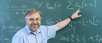 Prof. Dr. Christian Klingenberg in front of a blackboard