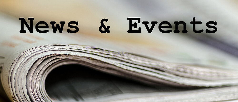 Zeitung mit Beschriftung "News und Events"