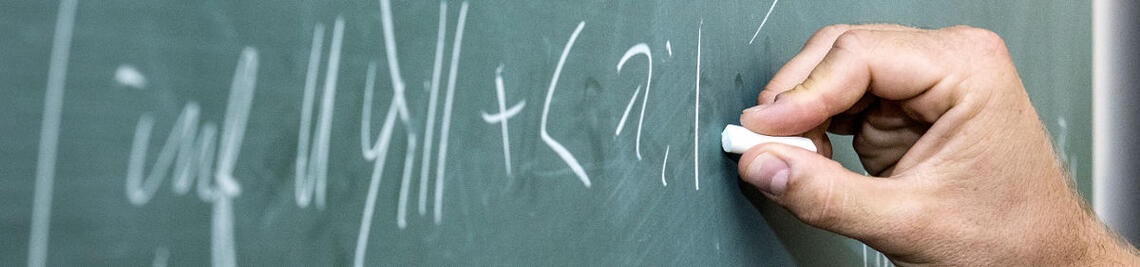 Mathematical formula on a blackboard